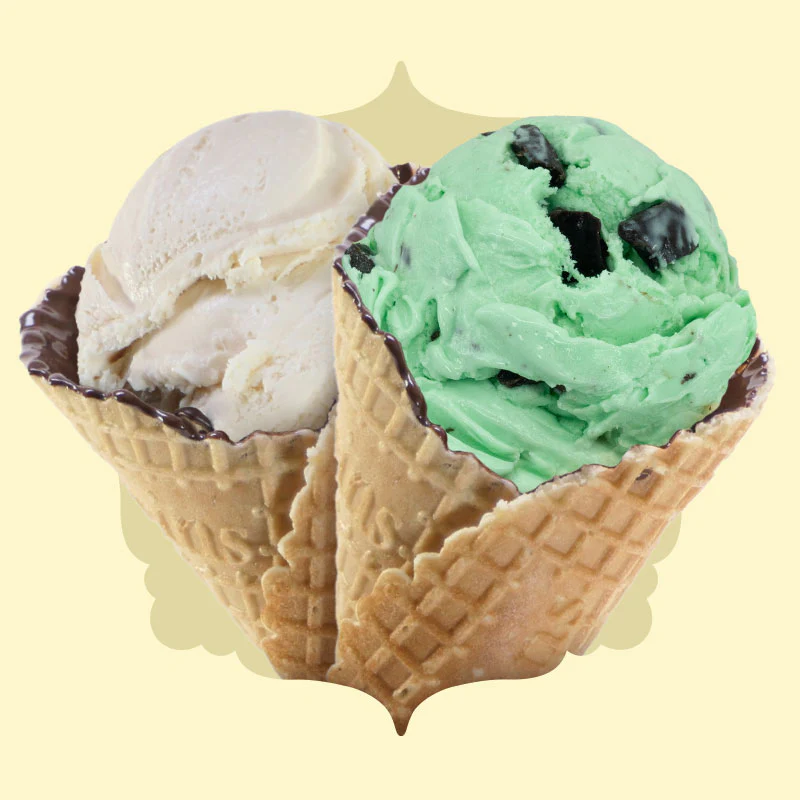 Vanilla and mint ice cream in waffle cones