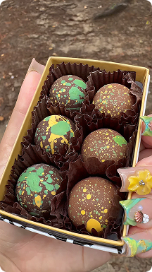 Box of colorful speckled dubai chocolate truffles with Anna Grigorian